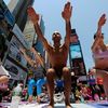 Summer Solstice Yoga Takes Over Times Square On Saturday